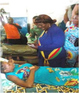 Hon. Etombi comes to the aid of a patient  