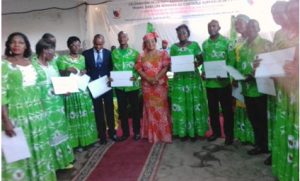 Some of the recipients pose with Minister Mbah Acha Rose