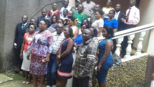 Participants pose for a family photo after the Kumba workshop