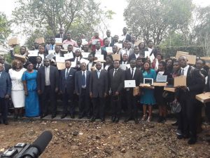 UB students pose with new laptops