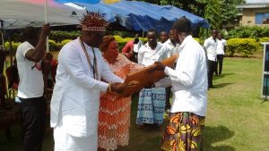 his royal Majesty chief Molive Molungu otto receiving gi