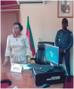 Minister Nalova Lyonga with sample of the computers