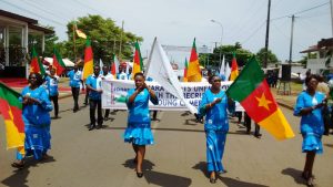 Sonara workers display national colour during march pass