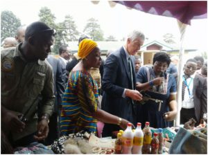 The US Ambassador, Henry Peter Balerin at the exhibition stand of the Support Groups Programme