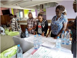 Participants drafting programme proposals on how to report conflicts