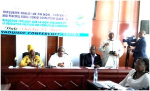 (L-R) Justine Kumche, Mbezele, Thomas Leremore on high table 