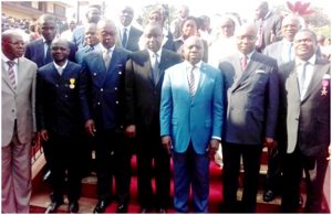 Minister Georges Elanga Obam flanked by pioneer collaborators  