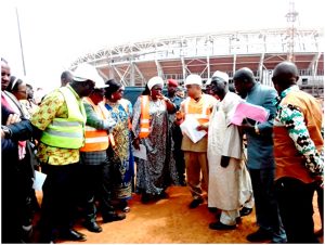 Minister Ketcha Courtes giving instructions in front of Paul Biya modern stadium 