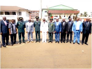 Administration pose with soldiers 