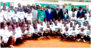  Pupils pose with Ministers Jules Doret Ndongo, Etoundi Ngoa, other officials