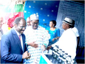 Former SONARA  GM, Ibrahim Talba Malla accompanies Minister Mouelle Kombi to SONARA’S exhibition stand, during Limbe FESTAC 2018 