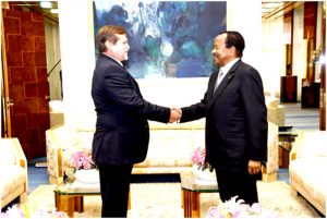 Biya in hand-shake with Russian Ambassador to Cameroon, Anatoly Bashkin