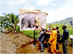 First Assistant SDO for Fako, Bejedi Otto II unveiling one of the Billboards along mile 3 in Limbe