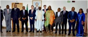  Government officials pose with French Ambassador and his delegation