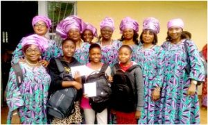 Members of the Benevolent Women Association  in a souvenir pic with the deserving students