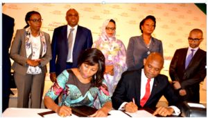  Tony Elumelu (R) signing conventions with UNDP rep for the training of youth entrepreneurs