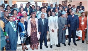 Participants pose with Minister Jules Doret Ndongo and Secretary of State