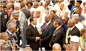   President Paul Biya smiling with PM Dion Ngute at New Year Wishes ceremony