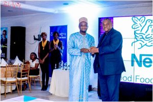  Communication Director, Banzeu representing Nestlé Cameroon receives award